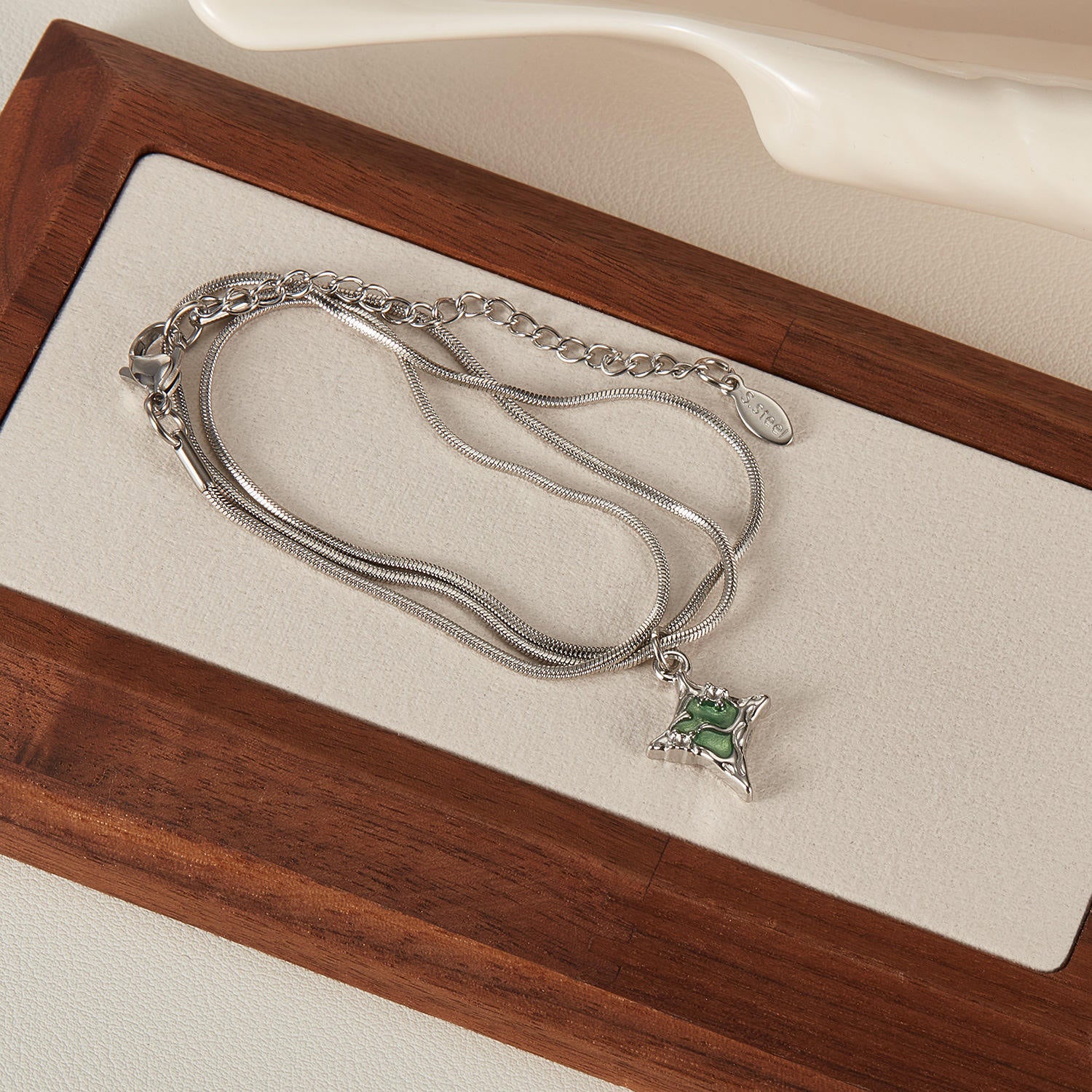 Asura-Wrapped Emerald Necklaces