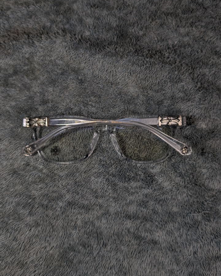 Eyeglasses on a textured gray surface