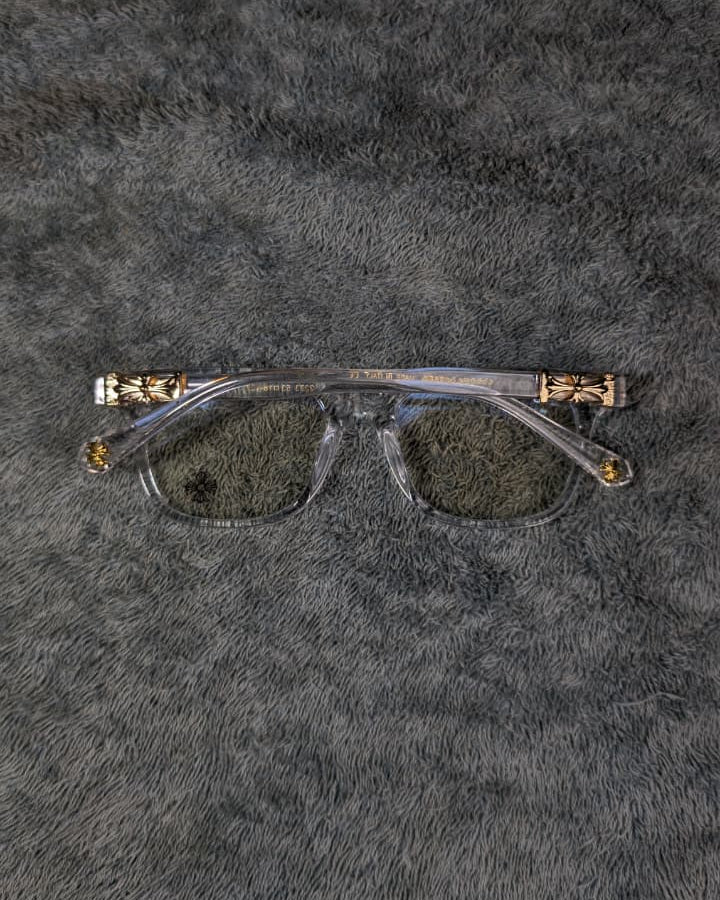 Sunglasses on a textured gray surface
